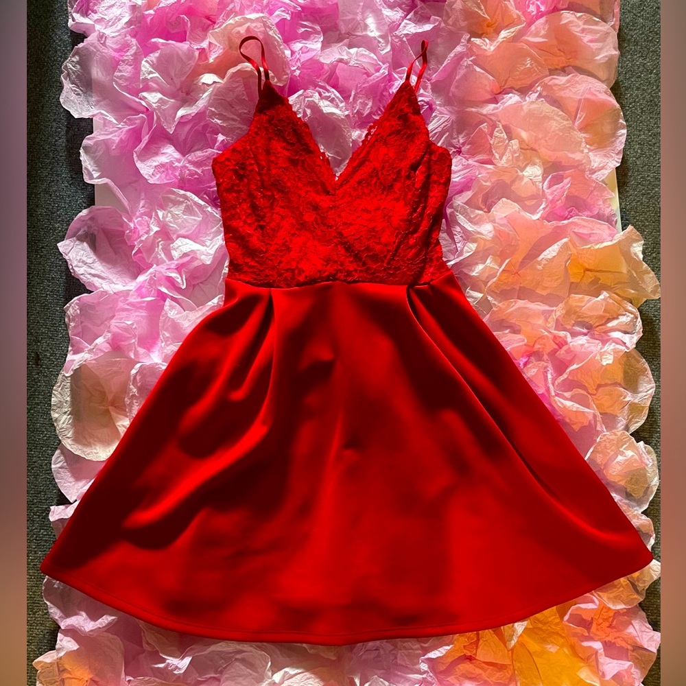 Charlotte Russe bright red lace top with flowy skirt. Very red & flattering fit!